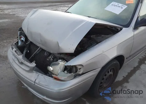 2000 Toyota Corolla Ce из США, поврежденный, VIN 1NXBR12E5YZ307385